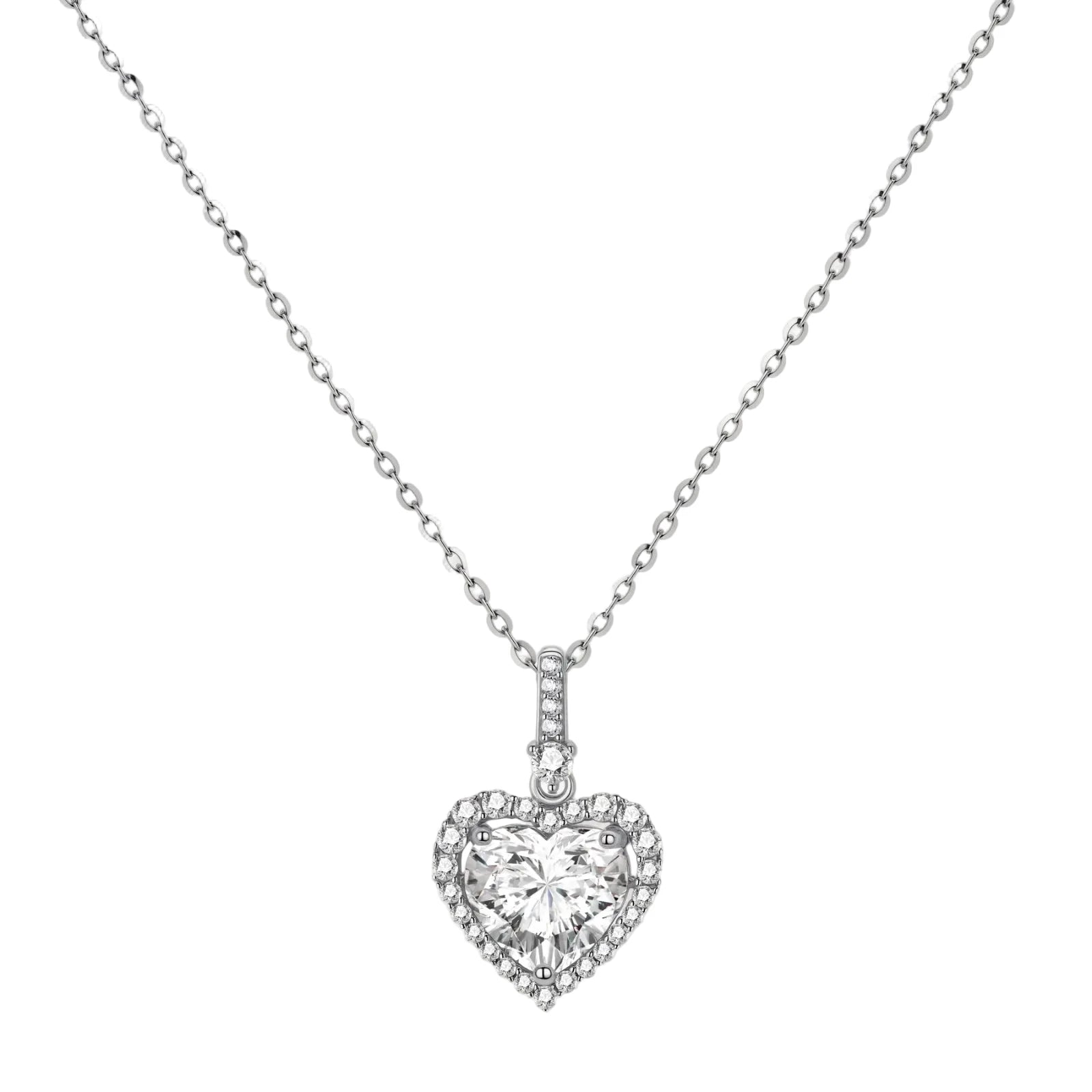 Complete jewelry set with heart-shaped sterling silver pieces featuring brilliant moissanite stones on white background.