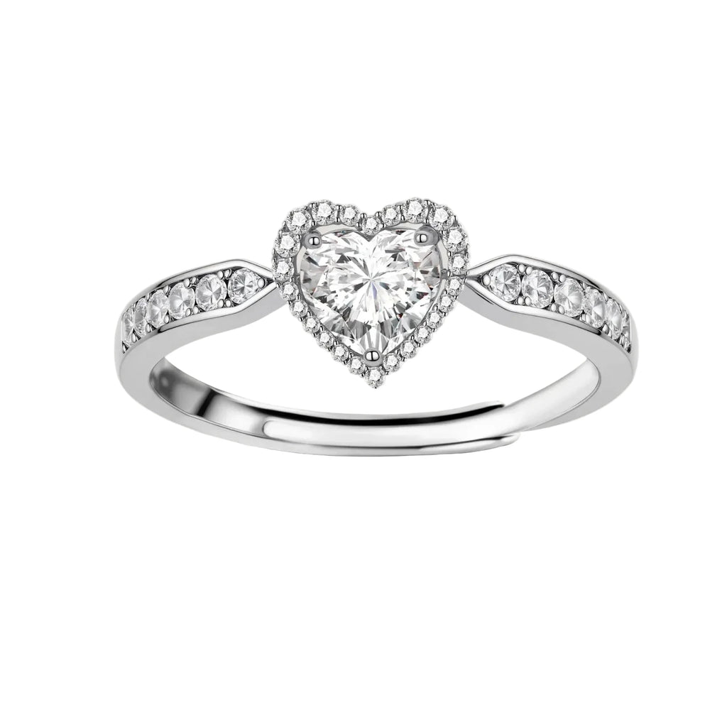 Complete jewelry set with heart-shaped sterling silver pieces featuring brilliant moissanite stones on white background.