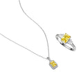 Yellow moissanite jewelry set with emerald-cut stones in sterling silver halo settings on white background.