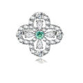 Sterling silver adjustable ring featuring four-leaf clover design with green center moissanite and clear accent stones