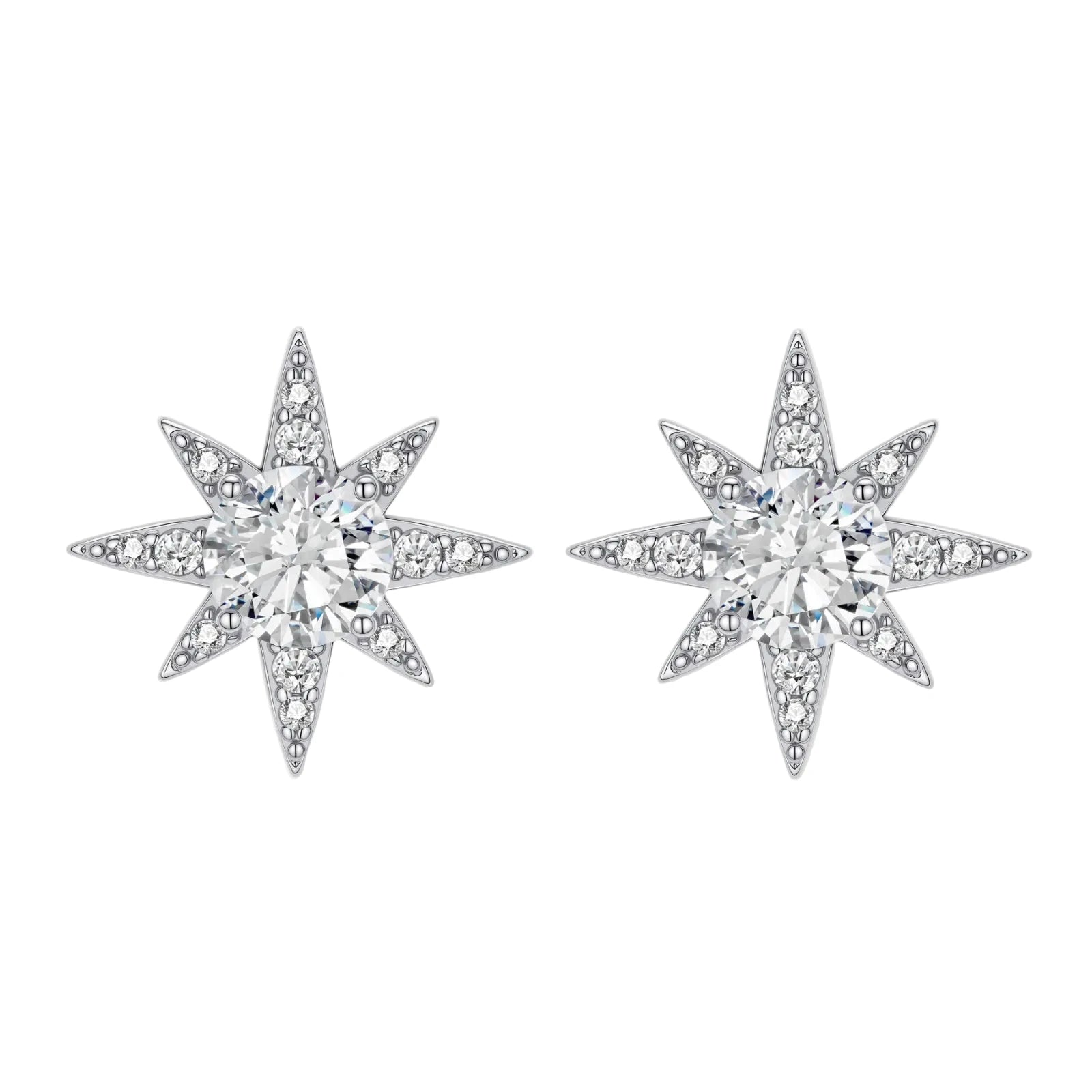 Sterling silver star-shaped stud earrings with brilliant moissanite center stones and pavé details on neutral background.