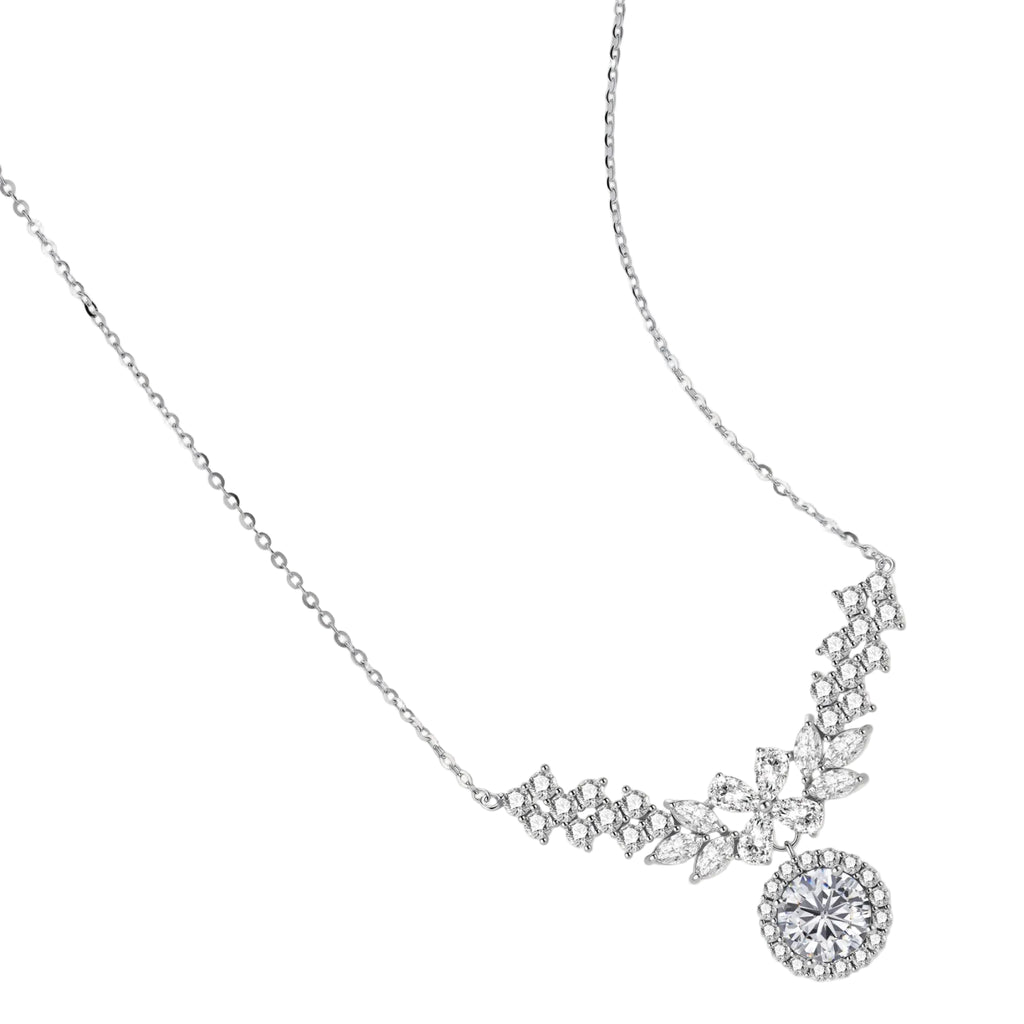 Elegant sterling silver necklace featuring intricate wing-like design with brilliant moissanite stones on neutral background.