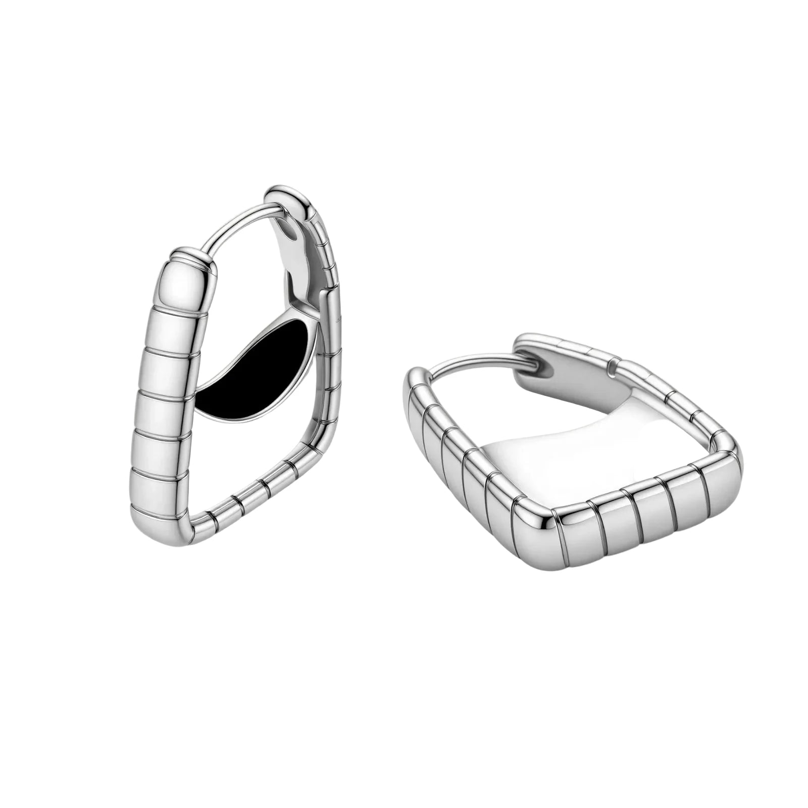 Close-up of platinum-plated sterling silver hoop earrings with horizontal textured grooves on white background.