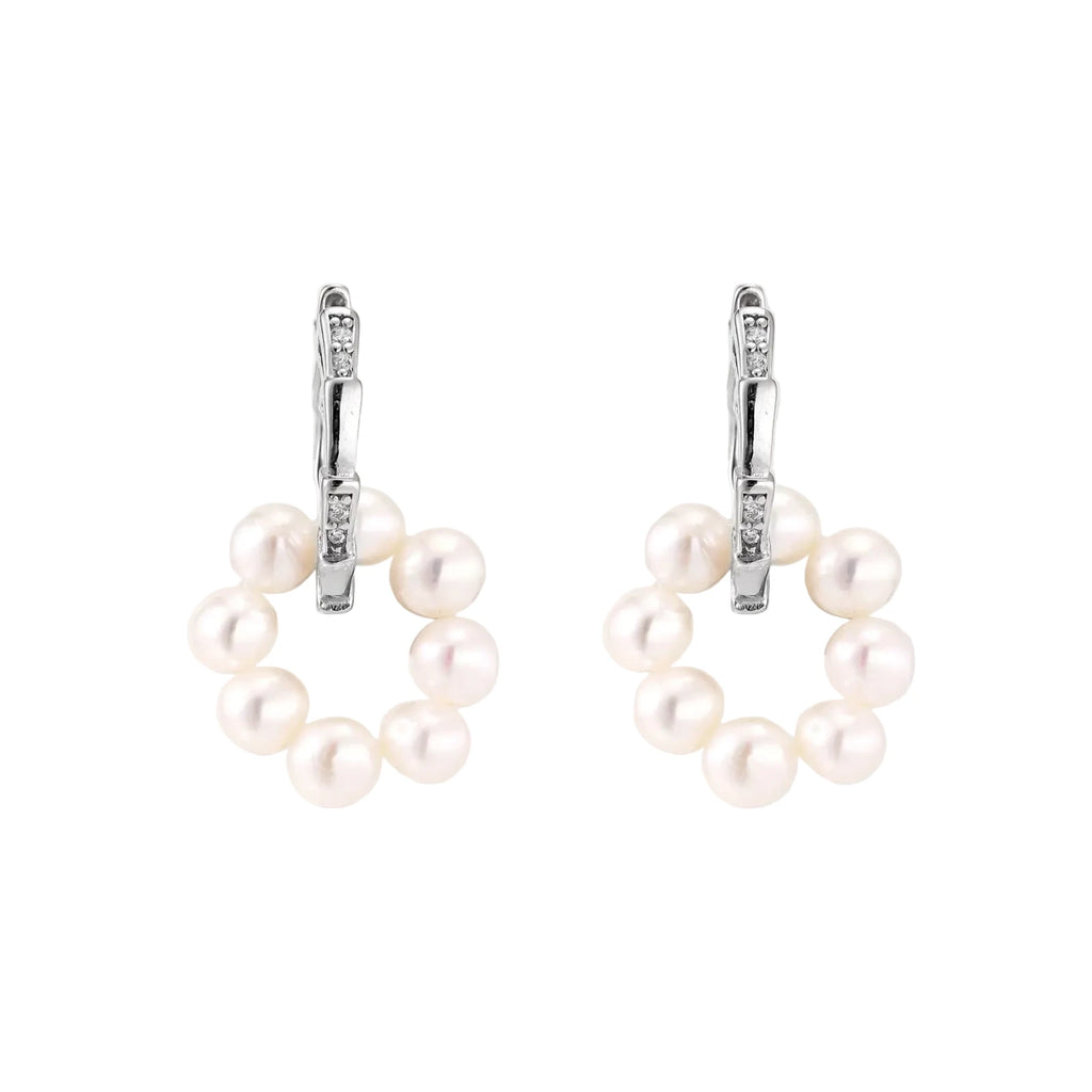 Rhodium-plated silver hoop earrings with freshwater pearls arranged in crescent formation and diamond accents