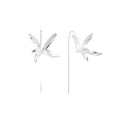 Delicate sterling silver dragonfly earrings with textured wings and curved threader hooks on white background