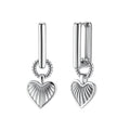 Platinum-plated 925 sterling silver rectangular hoop earrings with twisted ring connector and ribbed heart charm pendant.